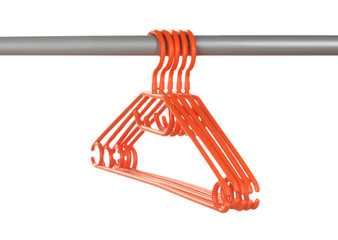 plastic hangers in row  isolated on white