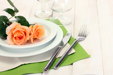 beautiful holiday table setting with flowers