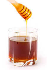 honey stick and glass
