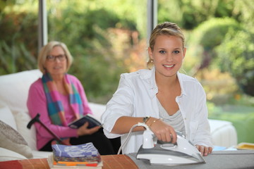 Woman helping with the ironing