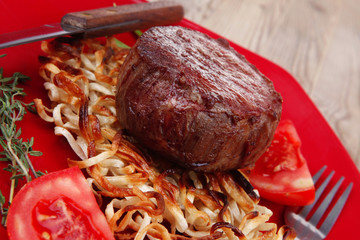 fillet medallions on noodles with red hot chili pepper