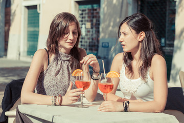 Two Young Women with a Cold Drink