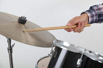 Drummer hitting a cymbal