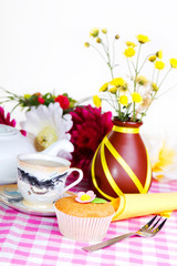 continental colorful  breakfast on a pink background