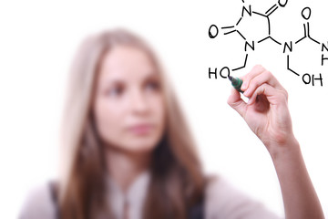 woman chemist shows a molecular structure