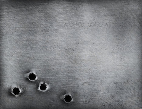 metal background with bullet holes