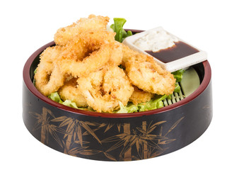 Deep batter fried squid rings calamari with green salad