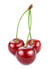 three cherries isolated on white