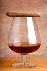 glass of cognac and cigar