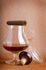 glass of cognac and cigar