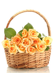 Fototapeta na wymiar beautiful bouquet of roses in basket isolated on white