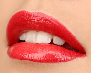 beautiful make up of glamour red gloss lips.