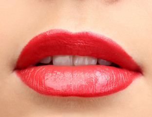 beautiful make up of glamour red gloss lips.