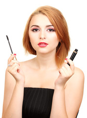 Obraz premium Beautiful young woman with mascara