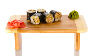 Tasty rolls served on wooden plate isolated on white