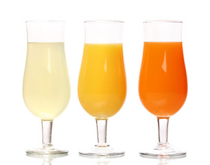 Tropical juices in glasses isolated on white