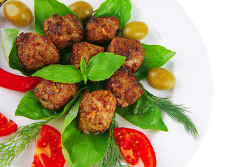 meat balls on basil leaf
