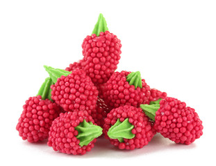 red candy raspberries isolated on white