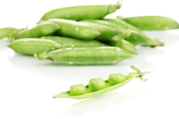 Green peas isolated on white