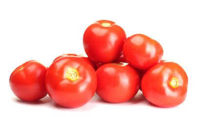 Ripe red tomatoes isolated on white
