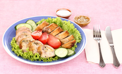Tasty meat cutlet with garnish on plate