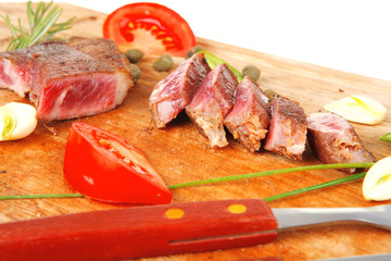 meat steak sliced on wood
