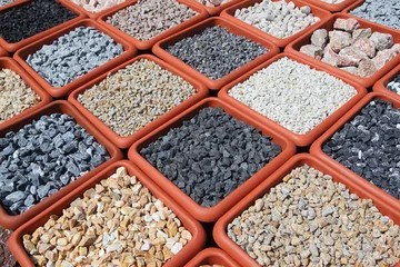 Fotobehang Baksteen Variation of rocks for garden  © Brebca