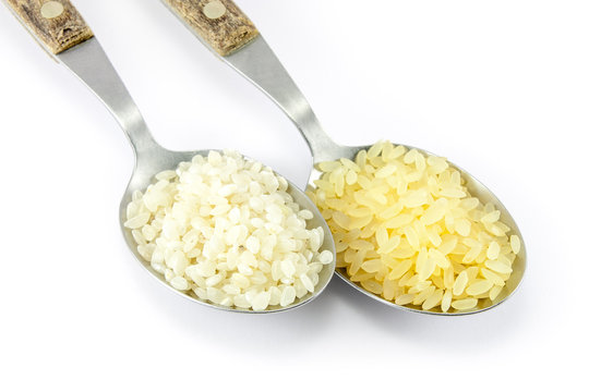 Two varieties of rice in two tablespoons