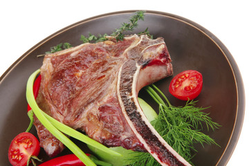 savory : roasted beef spare rib on dark dish with pepper