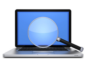 Laptop mit Lupe frontal