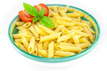 Bowl full of pens pasta with tomatoes and basil
