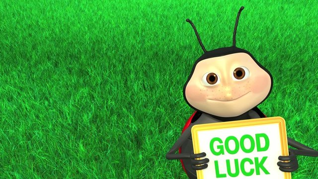 Marienk&auml;fer h&auml;lt "Good Luck" Schild hoch