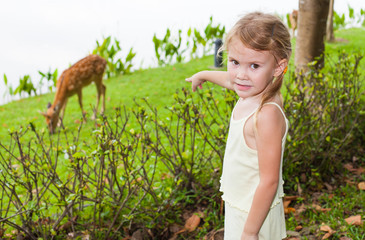 the girl in the park shows on deer