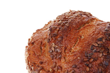 loaf of french rye bread topped with sunflower