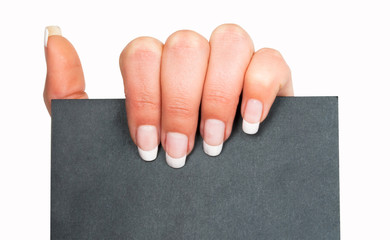 Female hand holding a black blank paper