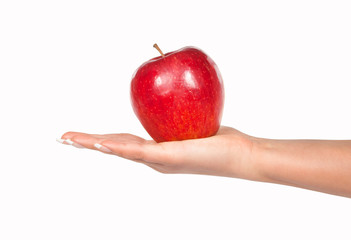 Woman hand holdig ripe apple isolated on white