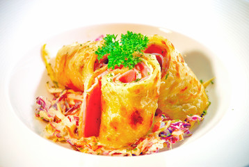 Ham and Cheese Roll on white plate