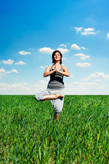 young woman practicing yoga