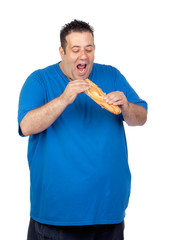 Happy fat man eating a large bread