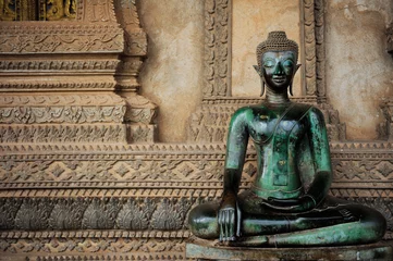 Fotobehang Buddhafigur in laos © freezetimetool