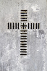 Eisernes Ornament mit Kreuz als Hintergrund