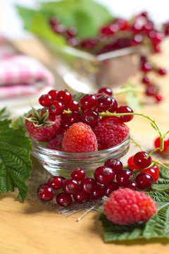 Red currant and raspberry on the glass bowl