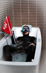 diver in bizarre bathroom immersion