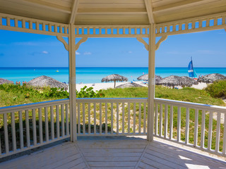 Tropical beach in Cuba seen from a typical house