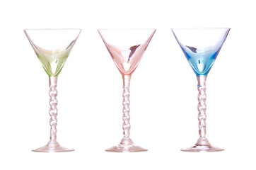 Line of colorful antique martini classes isolated on white