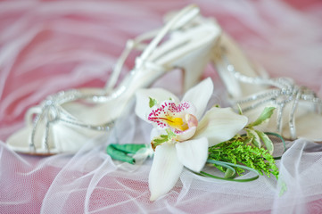Wedding shoes and flowers