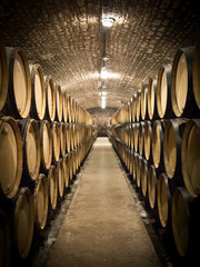 Barrels in wine cellar - obrazy, fototapety, plakaty