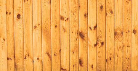 Piece of new wooden yellow fence