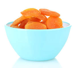 delicious dried apricots in bright bowl isolated on white