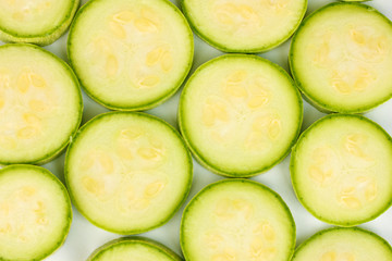 pieces of squash background on white close-up